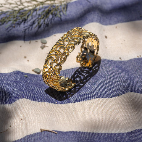 BRACCIALE RIGIDO DORATO