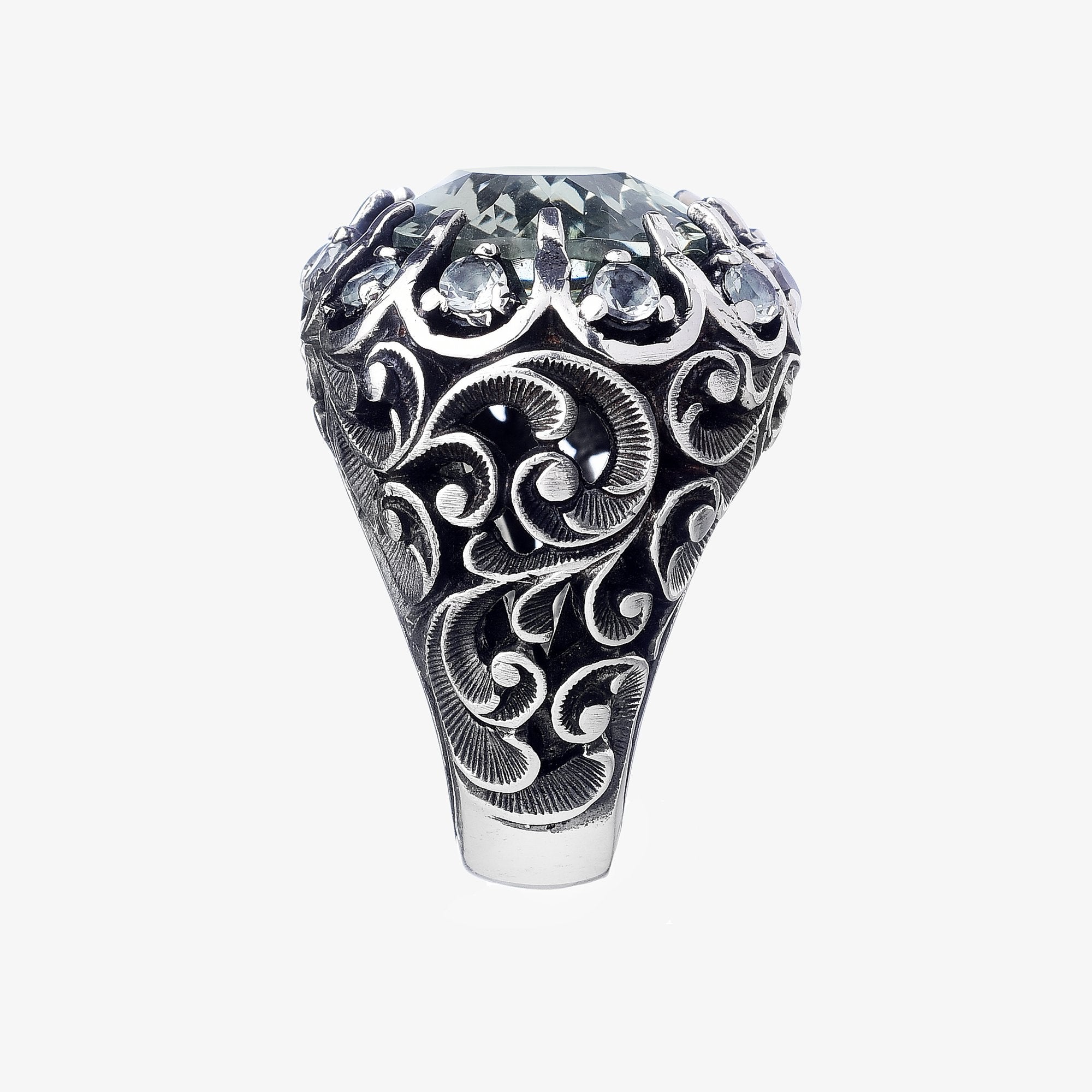 Ring with oval stone and crown stones