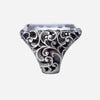 Ring with oval stone and damask plate