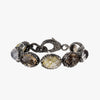 Bracelet with oval cabochon cut stones