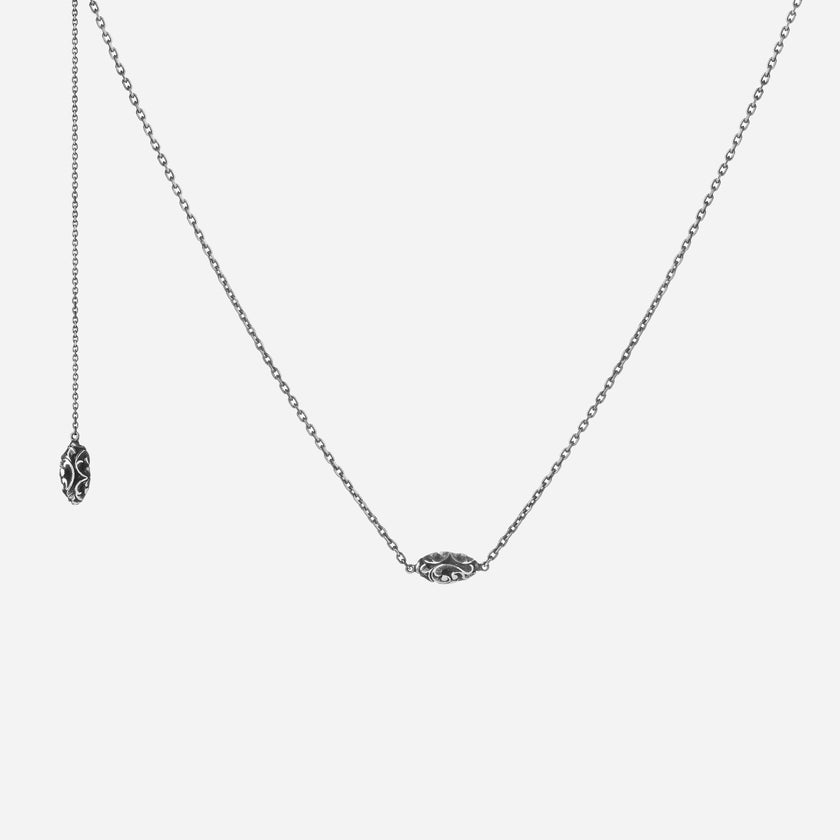 Collana a girocollo con elementi shiva lingam in argento brunito inciso 