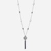 Collana con pendente piccolo ed elementi a giglio in argento brunito inciso, perle barocche e nappina finale. Chiusura a T barra