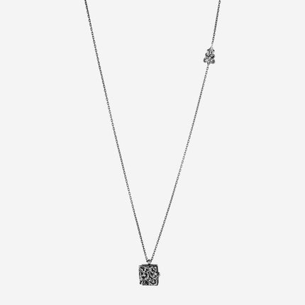 Collana pendente a libretto apribile in argento brunito inciso
