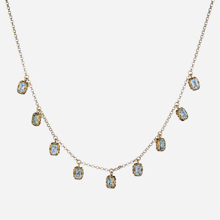 Shri necklace in yellow gold with 9 emerald cut stones